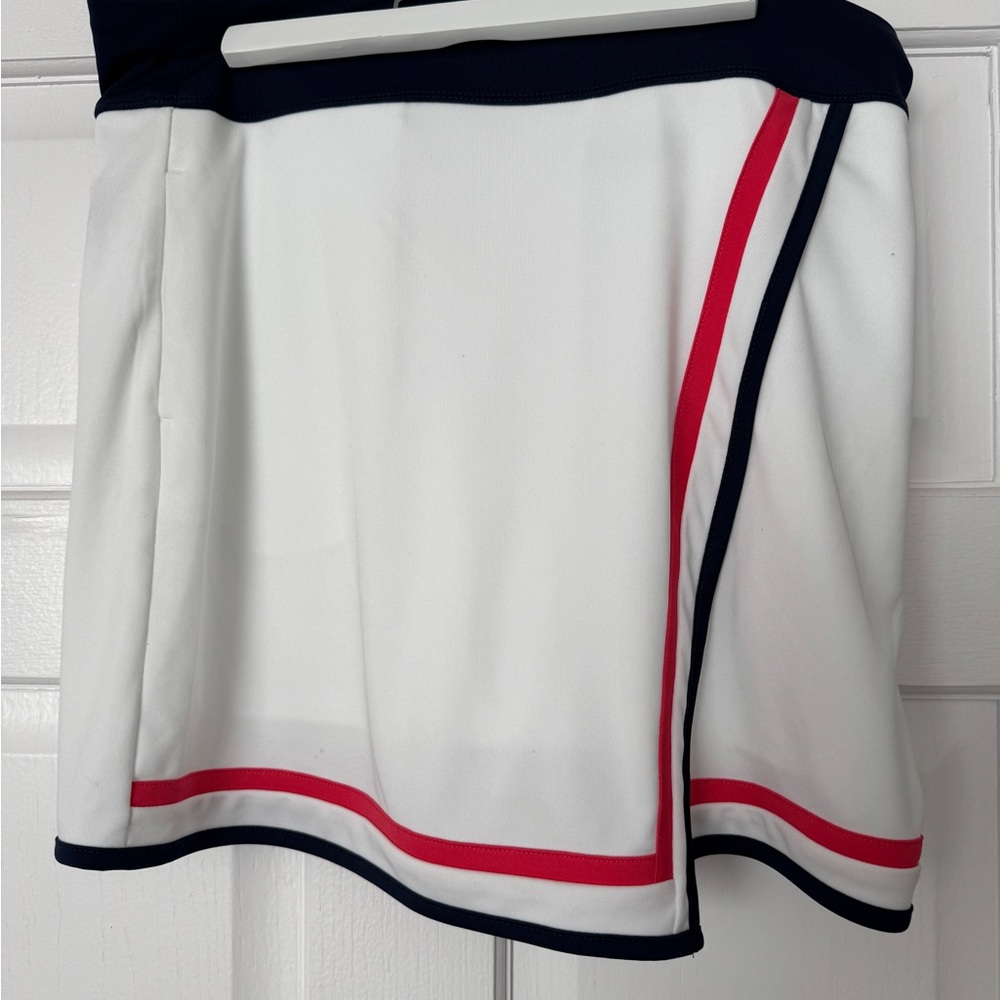 Callaway White golf Skort with Red and Blue Trim. Size Medium. Never used.
